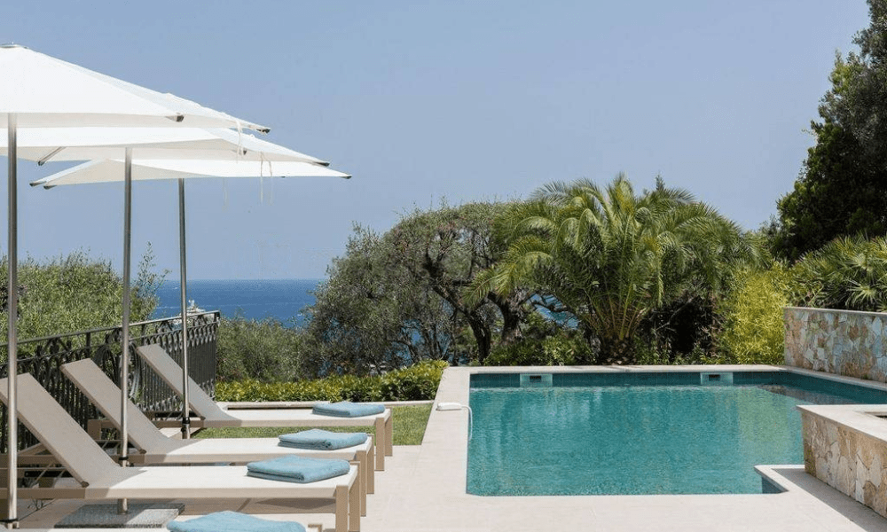 Poolside relaxation area with panoramic sea vistas